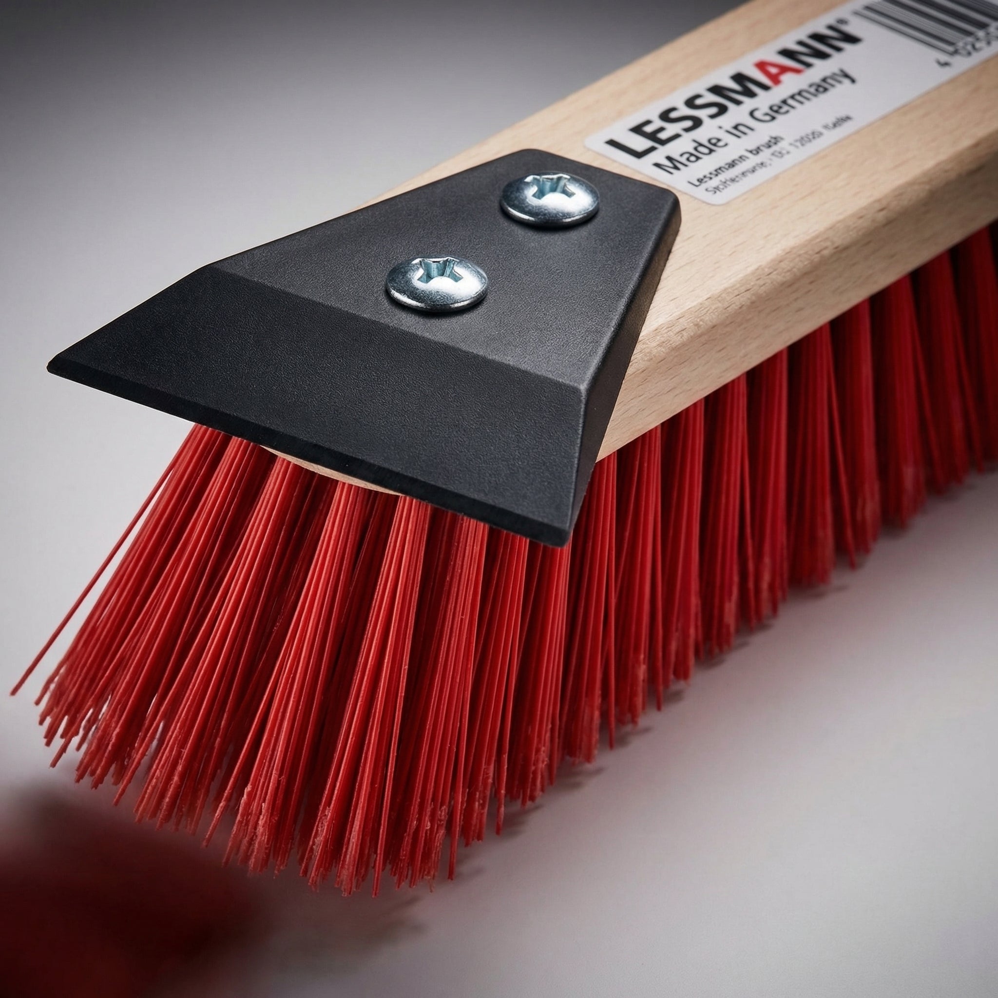 Reinigungsbürste mit Schaber für groben Schmutz